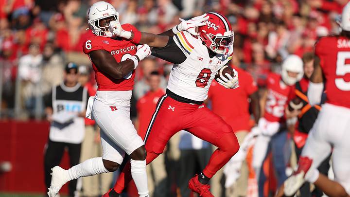 Nov 8, 2025; Piscataway, New Jersey, USA; Maryland Terrapins tight end Dorian Fleming (9) is tackled by Rutgers Scarlet Knights linebacker Abram Wright (6) during the first half at SHI Stadium. Mandatory Credit: Vincent Carchietta-Imagn Images Nov 8, 2025; Piscataway, New Jersey, USA; Maryland Terrapins tight end Dorian Fleming (9) is tackled by Rutgers Scarlet Knights linebacker Abram Wright (6) during the first half at SHI Stadium. Mandatory Credit: Vincent Carchietta-Imagn Images