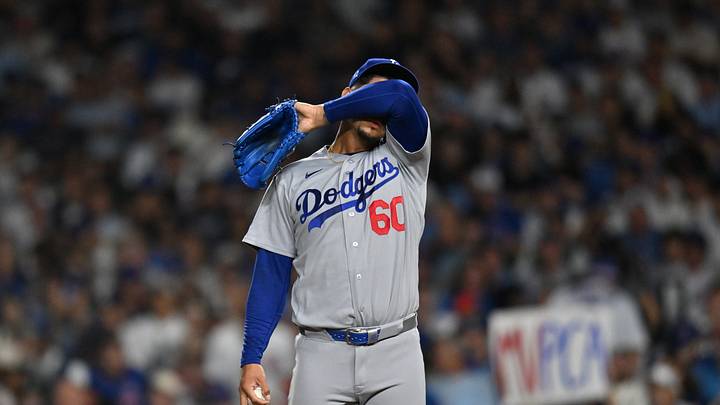 Aug 3, 2026; Chicago, Illinois, USA; Los Angeles Dodgers pitcher Edgardo Henriquez (60) reacts against the Chicago Cubs during the sixth inning at Wrigley Field. Mandatory Credit: Patrick Gorski-Imagn Images