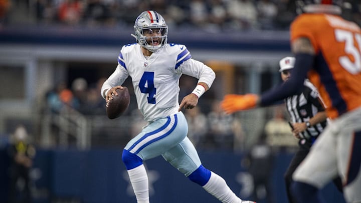 Dallas Cowboys quarterback Dak Prescott buys time to throw against the Denver Broncos defense. Dallas Cowboys quarterback Dak Prescott buys time to throw against the Denver Broncos defense.