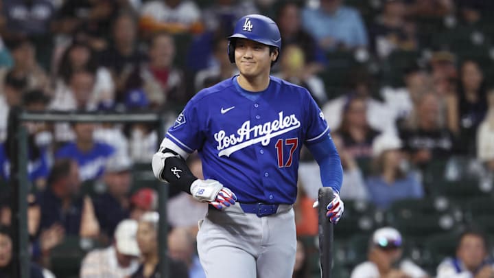 May 4, 2026; Houston, Texas, USA; Los Angeles Dodgers designated hitter Shohei Ohtani (17) smiles towards the Houston Astros dugout before batting during the first inning at Daikin Park. Mandatory Credit: Troy Taormina-Imagn Images