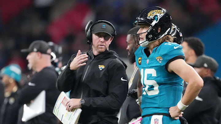 Oct 19, 2025; London, United Kingdom; Jacksonville Jaguars head coach Liam Coen talks with quarterback Trevor Lawrence (16) on the sidelines during the second half of an NFL International Series game at Wembley Stadium. Mandatory Credit: Kirby Lee-Imagn Images Oct 19, 2025; London, United Kingdom; Jacksonville Jaguars head coach Liam Coen talks with quarterback Trevor Lawrence (16) on the sidelines during the second half of an NFL International Series game at Wembley Stadium. Mandatory Credit: Kirby Lee-Imagn Images