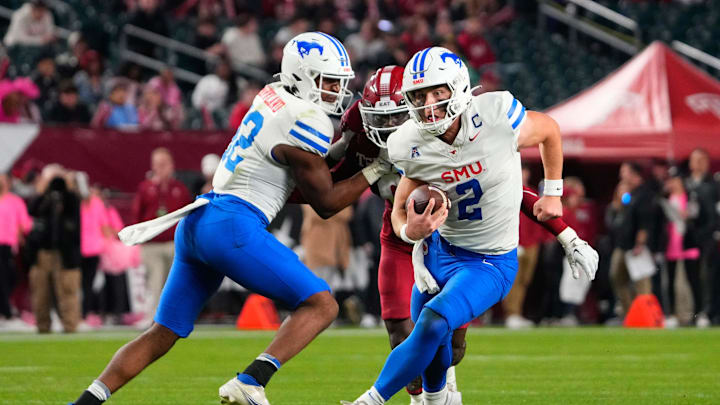 Oct 20, 2023; Philadelphia, Pennsylvania, USA; SMU Mustangs quarterback Preston Stone (2) runs with the ball against the Temple Owls during the first half at Lincoln Financial Field. Mandatory Credit: Gregory Fisher-Imagn Images