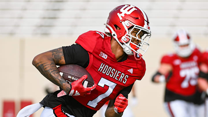 Indiana’s E.J. Williams Jr. (7) runs after a catch during spring practice at Memorial Stadium on Thursday, April 3, 2025.
