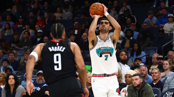 Jan 30, 2025; Memphis, Tennessee, USA; Memphis Grizzlies forward Santi Aldama (7) shoots for three during the first quarter against the Houston Rockets at FedExForum. Mandatory Credit: Petre Thomas-Imagn Images