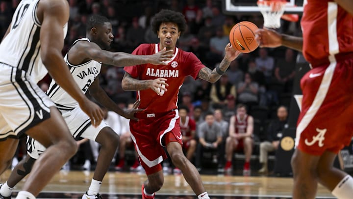 Jan 7, 2026; Nashville, Tennessee, USA; Alabama Crimson Tide guard Labaron Philon (0) passes the ball against the Vanderbilt Commodores during the first half at Memorial Gymnasium. Mandatory Credit: Steve Roberts-Imagn Images
