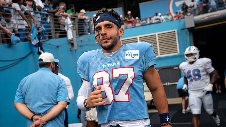 Tennessee Titans wide receiver Xavier Restrepo (87) heads to the field during the Blue and White Stadium Scrimmage at Nissan Stadium in Nashville, Tenn., Friday, Aug. 7, 2026. Tennessee Titans wide receiver Xavier Restrepo (87) heads to the field during the Blue and White Stadium Scrimmage at Nissan Stadium in Nashville, Tenn., Friday, Aug. 7, 2026.
