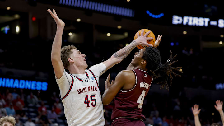 Mar 19, 2026; Oklahoma City, OK, USA; Saint Mary's (CA) Gaels center Andrew McKeever (45) blocks a shot by Texas A&M Aggies forward Jamie Vinson (4) during a first round game of the men's 2026 NCAA Tournament at Paycom Center. Mandatory Credit: Alonzo Adams-Imagn Images Mar 19, 2026; Oklahoma City, OK, USA; Saint Mary's (CA) Gaels center Andrew McKeever (45) blocks a shot by Texas A&M Aggies forward Jamie Vinson (4) during a first round game of the men's 2026 NCAA Tournament at Paycom Center. Mandatory Credit: Alonzo Adams-Imagn Images