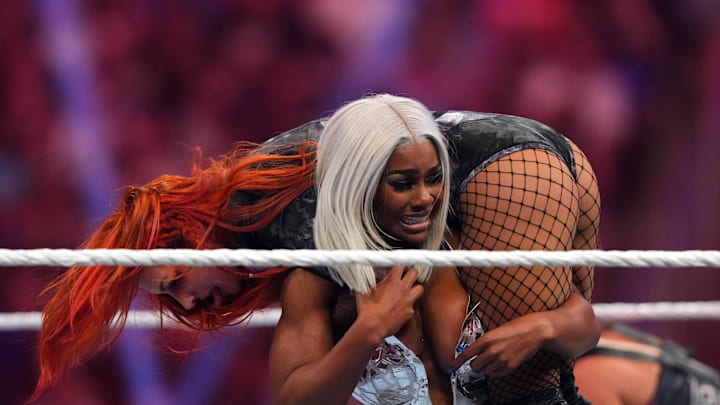 Jan 27, 2024; St. Petersburg, FL, USA; Jade Cargill  attacks Becky Lynch during the Women   s Royal Rumble match at Tropicana Field. Mandatory Credit: Joe Camporeale-USA TODAY Sports