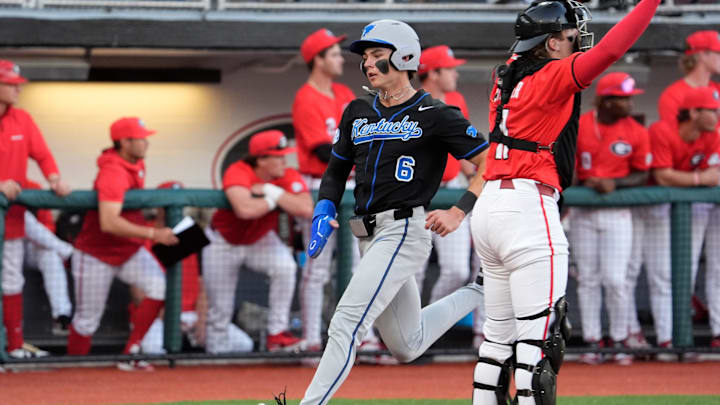 KentuckyÕs Tyler Bell (6) scores a run during a NCAA baseball game against Georgia on March 14, 2025.