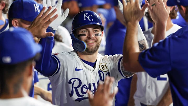 Sep 16, 2025; Kansas City, Missouri, USA; Kansas City Royals catcher Carter Jensen (22) is congratulated by teammates after hitting a home run in the bottom of the fourth inning against the Seattle Mariners at Kauffman Stadium. Mandatory Credit: Scott Sewell-Imagn Images Sep 16, 2025; Kansas City, Missouri, USA; Kansas City Royals catcher Carter Jensen (22) is congratulated by teammates after hitting a home run in the bottom of the fourth inning against the Seattle Mariners at Kauffman Stadium. Mandatory Credit: Scott Sewell-Imagn Images