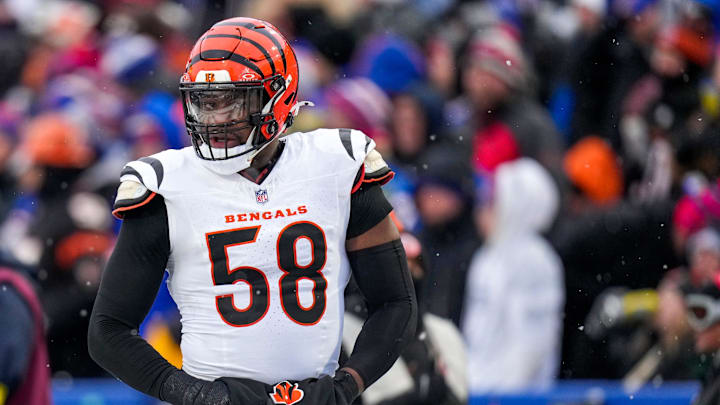 Cincinnati Bengals defensive end Joseph Ossai (58) walks for the locker room with trainers in the fourth quarter of the NFL Week 14 game between the Buffalo Bills and the Cincinnati Bengals at Highmark Stadium in Orchard Park, N.Y., on Sunday, Dec. 7, 2025. The Bills overcame a halftime deficit to win 39-34.