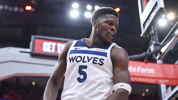 Feb 21, 2025; Houston, Texas, USA; Minnesota Timberwolves guard Anthony Edwards (5) reacts after scoring a basket during the second quarter against the Houston Rockets at Toyota Center. Mandatory Credit: Troy Taormina-Imagn Images