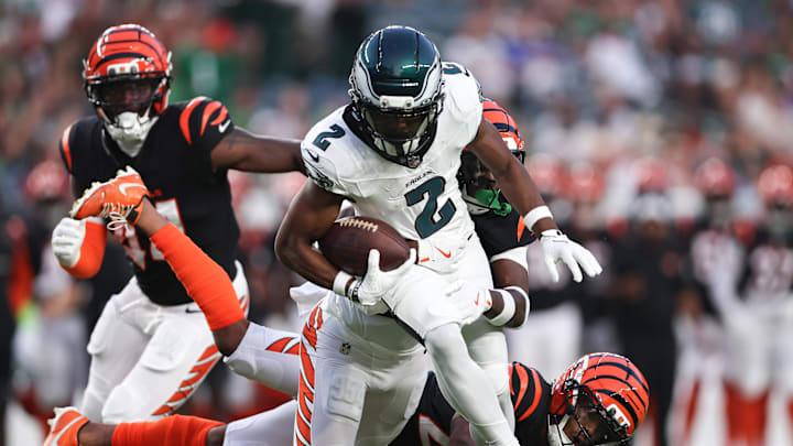 Aug 7, 2025; Philadelphia, Pennsylvania, USA; Philadelphia Eagles wide receiver Jahan Dotson (2) runs with the ball against Cincinnati Bengals safety Jordan Battle (27) after a catch during the first quarter at Lincoln Financial Field. 