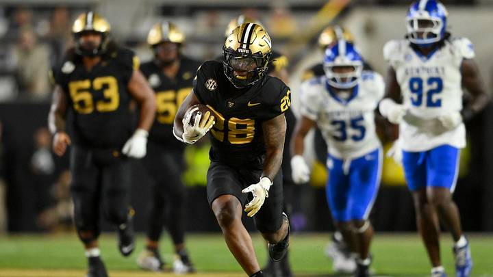 Nov 22, 2025; Nashville, Tennessee, USA;  Vanderbilt Commodores running back Sedrick Alexander (28) runs with the ball after a made catch against the Kentucky Wildcats during the second half at FirstBank Stadium. Mandatory Credit: Steve Roberts-Imagn Images