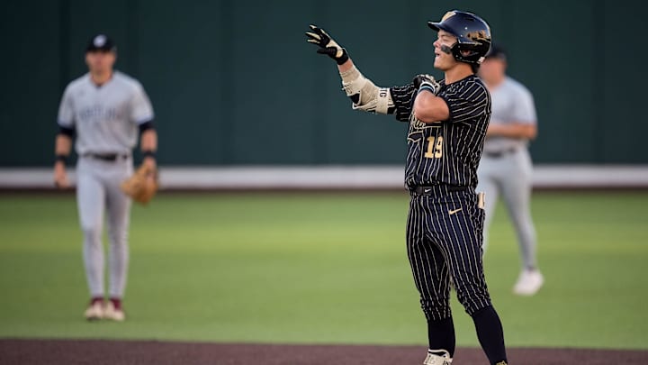 Vanderbilt center fielder Rustan Rigdon (19) celebrates after his 2-RBI double against South Carolina during the second inning at Hawkins Field in Nashville, Tenn., Thursday, May 14, 2026.