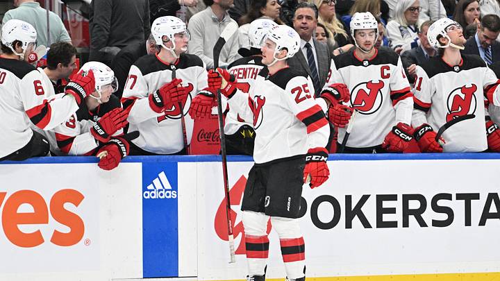 Apr 11, 2024; Toronto, Ontario, CAN; New Jersey Devils forward Nolan Foote (25) celebrates with teammates at the bench after scoring a goal against the Toronto Maple Leafs in the first period at Scotiabank Arena. Mandatory Credit: Dan Hamilton-USA TODAY Sports Apr 11, 2024; Toronto, Ontario, CAN; New Jersey Devils forward Nolan Foote (25) celebrates with teammates at the bench after scoring a goal against the Toronto Maple Leafs in the first period at Scotiabank Arena. Mandatory Credit: Dan Hamilton-USA TODAY Sports