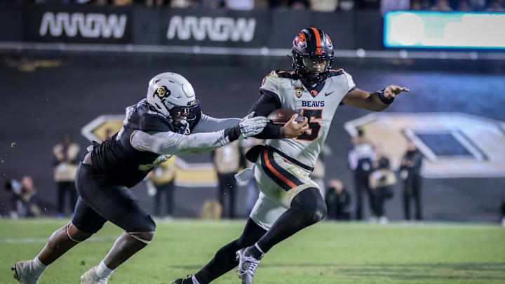 Nov 4, 2023; Boulder, Colorado, USA; Oregon State Beavers quarterback DJ Uiagalelei (5) breaks past