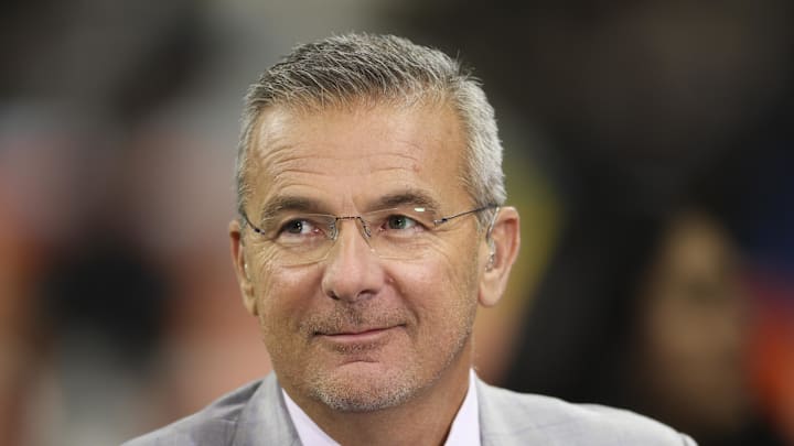 Dec 3, 2022; Indianapolis, Indiana, USA; FOX Sports analyst Urban Meyer before the Big Ten Championship between the Michigan Wolverines and the Purdue Boilermakers at Lucas Oil Stadium. Mandatory Credit: Trevor Ruszkowski-Imagn Images