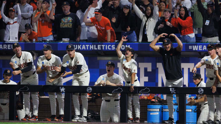 Jun 9, 2024; Lexington, KY, USA; Oregon State Beavers infielder Dawson Santana (28) and teammates celebrate after a run is scored during the fourth inning against the Kentucky Wildcats and teammates celebrate after at Kentucky Proud Park. Mandatory Credit: Jordan Prather-USA TODAY Sports Jun 9, 2024; Lexington, KY, USA; Oregon State Beavers infielder Dawson Santana (28) and teammates celebrate after a run is scored during the fourth inning against the Kentucky Wildcats and teammates celebrate after at Kentucky Proud Park. Mandatory Credit: Jordan Prather-USA TODAY Sports