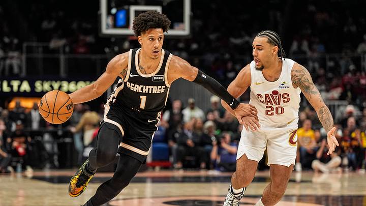 Apr 10, 2026; Atlanta, Georgia, USA; Atlanta Hawks forward Jalen Johnson (1) dribbles against Cleveland Cavaliers guard Jaylon Tyson (20) during the first half at State Farm Arena. Mandatory Credit: Dale Zanine-Imagn Images Apr 10, 2026; Atlanta, Georgia, USA; Atlanta Hawks forward Jalen Johnson (1) dribbles against Cleveland Cavaliers guard Jaylon Tyson (20) during the first half at State Farm Arena. Mandatory Credit: Dale Zanine-Imagn Images