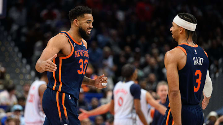 Dec 30, 2024; Washington, District of Columbia, USA; New York Knicks center Karl-Anthony Towns (32) reacts with guard Josh Hart (3) after a field goal during the fourth quarter against the Washington Wizards at Capital One Arena. Mandatory Credit: Reggie Hildred-Imagn Images