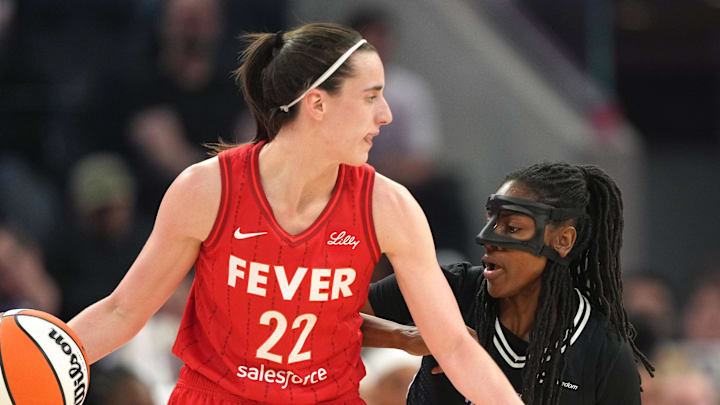 Golden State Valkyries guard Tiffany Hayes (15) defends against Indiana Fever guard Caitlin Clark (22) at Chase Center. 