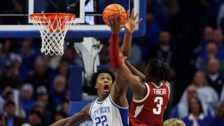 Feb 1, 2025; Lexington, Kentucky, USA; Kentucky Wildcats center Amari Williams (22) defends the basket against Arkansas Razorbacks forward Adou Thiero (3) during the second half at Rupp Arena at Central Bank Center. Mandatory Credit: Jordan Prather-Imagn Images