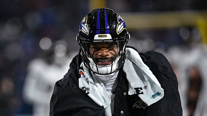 Jan 19, 2025; Orchard Park, New York, USA; Baltimore Ravens quarterback Lamar Jackson (8) warms up before a 2025 AFC divisional round game against the Buffalo Bills at Highmark Stadium. Mandatory Credit: Mark Konezny-Imagn Images