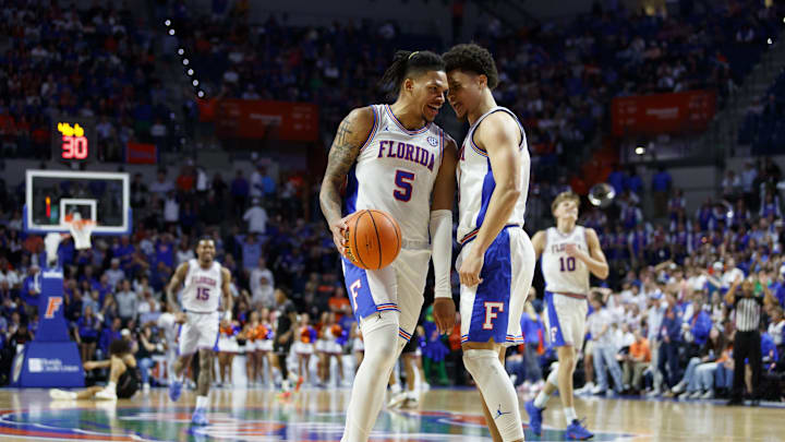 Mar 1, 2025; Gainesville, Florida, USA; Florida Gators guard Will Richard (5) and guard Walter Clayton Jr. (1) react after a play against the Texas A&M Aggies during the second half at Exactech Arena at the Stephen C. O'Connell Center. Mandatory Credit: Morgan Tencza-Imagn Images