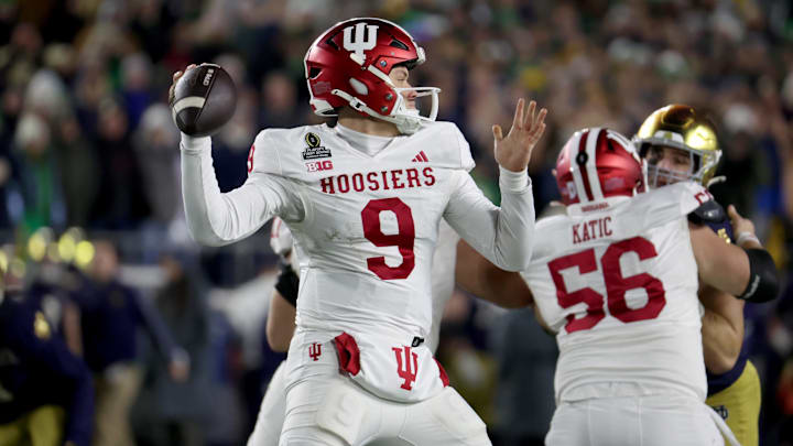 Dec 20, 2024; Notre Dame, Indiana, USA; Indiana Hoosiers quarterback Kurtis Rourke (9) throws during the second half against the Notre Dame Fighting Irish at Notre Dame Stadium. Mandatory Credit: Trevor Ruszkowski-Imagn Images