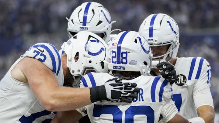 Sep 14, 2025; Indianapolis, Indiana, USA; Indianapolis Colts running back Jonathan Taylor (28) celebrates with his teammates after rushing for a touchdown during a game against the Denver Broncos at Lucas Oil Stadium at Lucas Oil Stadium. 