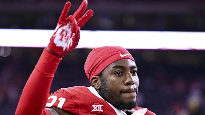Dec 27, 2025; Houston, TX, USA; Houston Cougars defensive back Zelmar Vedder (21) looks on during the game against the Louisiana State Tigers at NRG Stadium. Mandatory Credit: Maria Lysaker-Imagn Images 