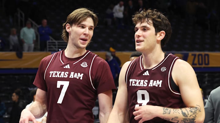 Dec 2, 2025; Pittsburgh, Pennsylvania, USA; Texas A&M Aggies forward Zach Clemence (7) and guard Rubén Dominguez (9) react after defeating the Pittsburgh Panthers at the Petersen Events Center. Mandatory Credit: Charles LeClaire-Imagn Images Dec 2, 2025; Pittsburgh, Pennsylvania, USA; Texas A&M Aggies forward Zach Clemence (7) and guard Rubén Dominguez (9) react after defeating the Pittsburgh Panthers at the Petersen Events Center. Mandatory Credit: Charles LeClaire-Imagn Images