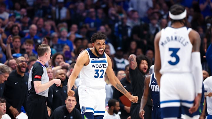 May 28, 2024; Dallas, Texas, USA; Minnesota Timberwolves center Karl-Anthony Towns (32) reacts after scoring during the second half against the Dallas Mavericks during game four of the western conference finals for the 2024 NBA playoffs at American Airlines Center. Mandatory Credit: Kevin Jairaj-Imagn Images