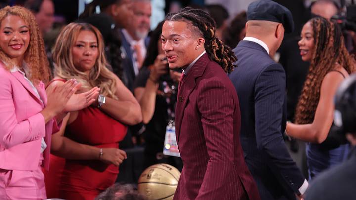 Jun 23, 2026; New York, NY, USA; The eighth pick in the 2026 NBA draft, Houston guard Kingston Flemings reacts after he was selected by the Atlanta Hawks at Barclays Center. Mandatory Credit: Brad Penner-Imagn Images