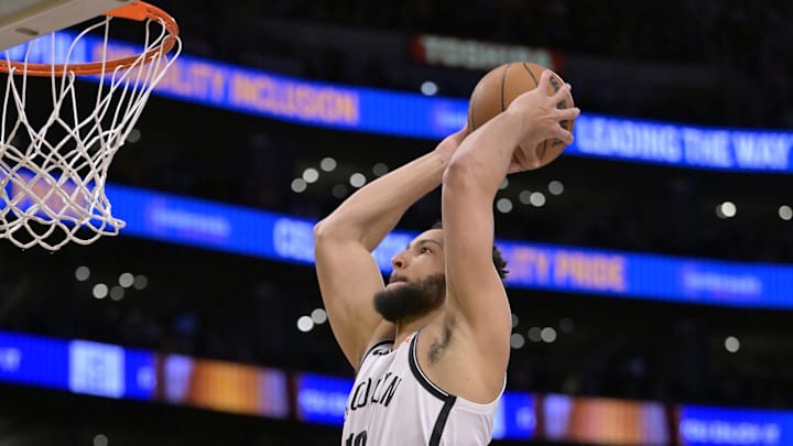 Jan 17, 2025; Los Angeles, California, USA;  Brooklyn Nets guard Ben Simmons (10) dunks against the Los Angeles Lakers at Crypto.com Arena. Mandatory Credit: Jayne Kamin-Oncea-Imagn Images