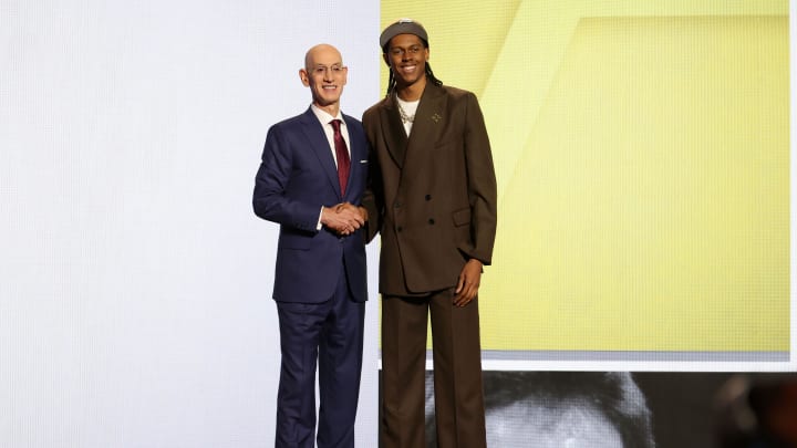 Jun 26, 2024; Brooklyn, NY, USA; Cody Williams poses for photos with NBA commissioner Adam Silver after being selected in the first round by the Utah Jazz in the 2024 NBA Draft at Barclays Center. Mandatory Credit: Brad Penner-USA TODAY Sports Jun 26, 2024; Brooklyn, NY, USA; Cody Williams poses for photos with NBA commissioner Adam Silver after being selected in the first round by the Utah Jazz in the 2024 NBA Draft at Barclays Center. Mandatory Credit: Brad Penner-USA TODAY Sports