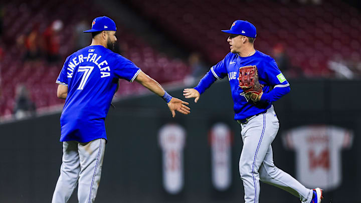 Sep 2, 2025; Cincinnati, Ohio, USA; Toronto Blue Jays third baseman Isiah Kiner-Falefa (7) high fives outfielder Myles Straw (3) after the victory over the Cincinnati Reds at Great American Ball Park. Mandatory Credit: Katie Stratman-Imagn Images