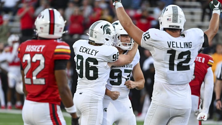 Sep 7, 2024; College Park, Maryland, USA; Michigan State Spartans place kicker Jonathan Kim (97) reactors after making the eventual game winning field goal against the Maryland Terrapins during the second half  at SECU Stadium. Mandatory Credit: Tommy Gilligan-Imagn Images