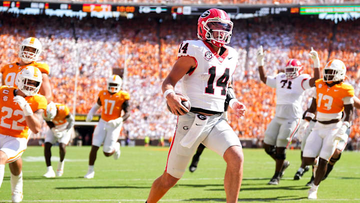 Georgia quarterback Gunner Stockton (14) runs into the end zone for a touchdown during a college football game between Tennessee and Georgia at Neyland Stadium in Knoxville, Tenn., on Sept. 13, 2025.
