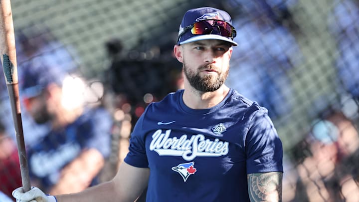 Toronto Blue Jays right fielder Nathan Lukes warms up.