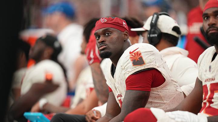 Arizona Cardinals running back Jeremiyah Love (4) looks on from the sideline as they play the Seattle Seahawks at State Farm Stadium in Glendale on Sept. 20, 2026. Arizona Cardinals running back Jeremiyah Love (4) looks on from the sideline as they play the Seattle Seahawks at State Farm Stadium in Glendale on Sept. 20, 2026.