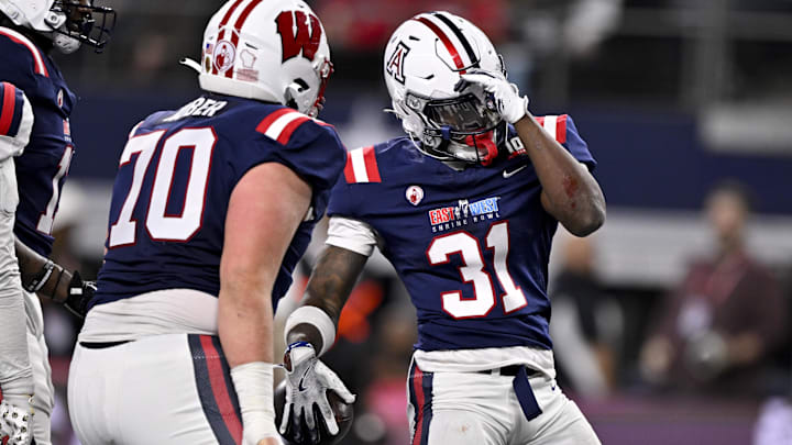 Jan 30, 2025; Arlington, TX, USA; East running back Jacory Croskey-Merritt of Arizona (31)  