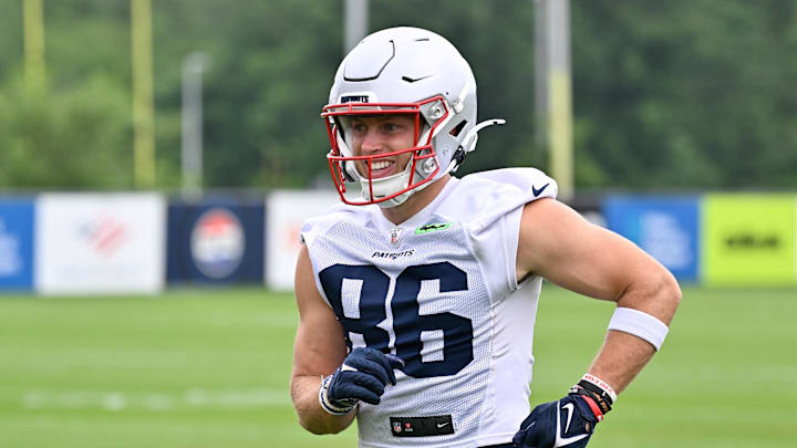 Jun 9, 2025; Foxborough, MA, USA; New England Patriots wide receiver Efton Chism III (86) reacts after completing a drill during minicamp at Gillette Stadium. Mandatory Credit: Eric Canha-Imagn Images