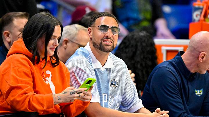 Jun 20, 2026; Arlington, Texas, USA; Dallas Mavericks guard Klay Thompson watches the game between the Dallas Wings and the Chicago Sky during the first half at College Park Center. Mandatory Credit: Jerome Miron-Imagn Images Jun 20, 2026; Arlington, Texas, USA; Dallas Mavericks guard Klay Thompson watches the game between the Dallas Wings and the Chicago Sky during the first half at College Park Center. Mandatory Credit: Jerome Miron-Imagn Images