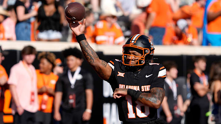 Oklahoma State Cowboys quarterback Sam Jackson V (18) warms up before a college football game between the Oklahoma State Cowboys (OSU) and the Houston Cougars at Boone Pickens Stadium in Stillwater, Okla., Saturday, Oct. 11, 2025. Oklahoma State Cowboys quarterback Sam Jackson V (18) warms up before a college football game between the Oklahoma State Cowboys (OSU) and the Houston Cougars at Boone Pickens Stadium in Stillwater, Okla., Saturday, Oct. 11, 2025.