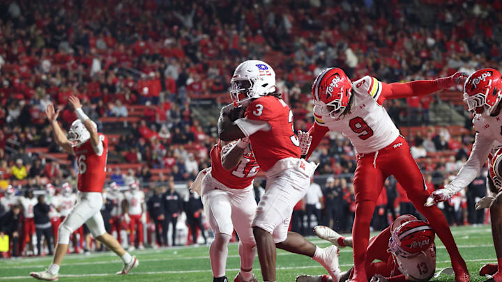 Nov 8, 2025; Piscataway, New Jersey, USA; Rutgers Scarlet Knights running back Antwan Raymond (3) celebrates after a rushing touchdown during the second half against the Maryland Terrapins at SHI Stadium. Mandatory Credit: Vincent Carchietta-Imagn Images