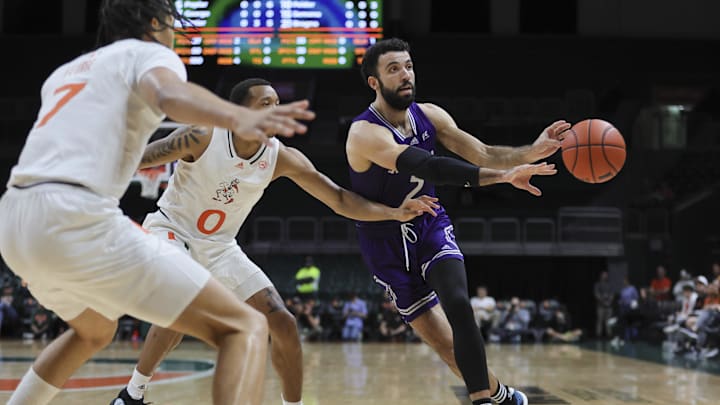 Dec 21, 2023; Coral Gables, Florida, USA; Stonehill Skyhawks forward Max Zegarowski (2) passes the