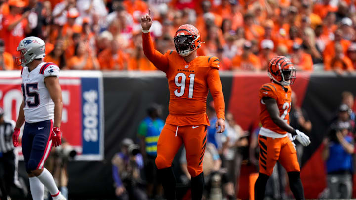 Sep 8, 2024; Cincinnati, Ohio, USA; Cincinnati Bengals defensive end Trey Hendrickson (91) celebrates after a false start penalty on the Patriots in the first quarter of the NFL Week 1 game between the Cincinnati Bengals and the New England Patriots at Paycor Stadium. Mandatory Credit: Sam Greene/USA TODAY Network via Imagn Images Sep 8, 2024; Cincinnati, Ohio, USA; Cincinnati Bengals defensive end Trey Hendrickson (91) celebrates after a false start penalty on the Patriots in the first quarter of the NFL Week 1 game between the Cincinnati Bengals and the New England Patriots at Paycor Stadium. Mandatory Credit: Sam Greene/USA TODAY Network via Imagn Images