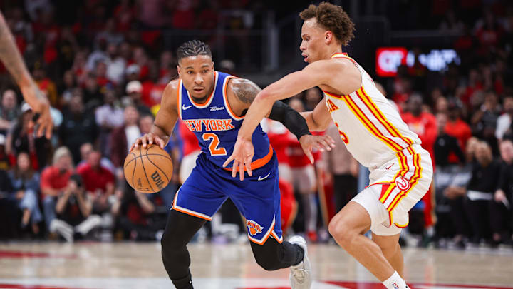 Apr 23, 2026; Atlanta, Georgia, USA; New York Knicks guard Miles McBride (2) drives on Atlanta Hawks guard Dyson Daniels (5) in the second quarter during game three of the first round of the 2026 NBA Playoffs at State Farm Arena. Mandatory Credit: Brett Davis-Imagn Images